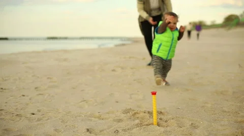 First steps a baby at the beach Stock Footage 63142726