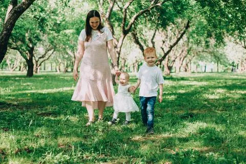 The first steps of the baby. Stock Photos