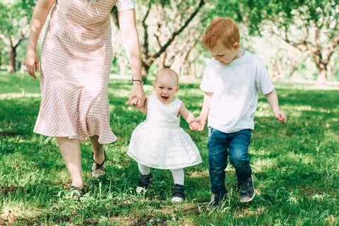 The first steps of the baby. Stock Photos