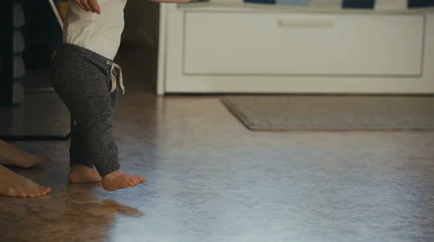 First steps of cute baby boy Stock Footage 61082096
