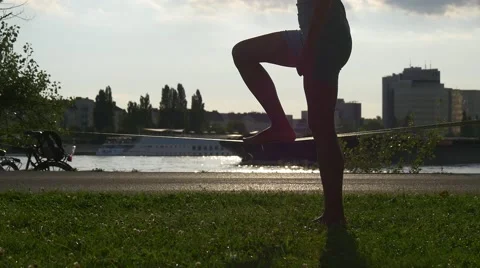 First steps on slackline Stock Footage 67476628