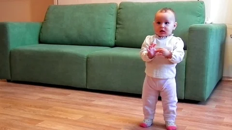 The first steps of a small child Stock Footage 86317352