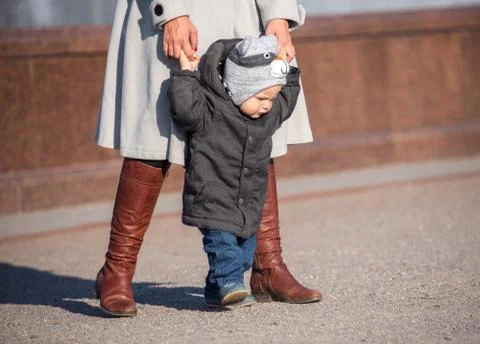 First steps of toddler Stock Photos