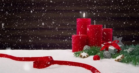 First Sunday of Advent - Beautiful snowfall in front of a Christmas decoration Vídeos de archivo 82339657