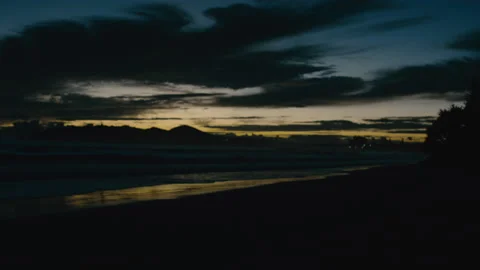 First sunlight in the sky from a beach landscape Stock Footage 169305883