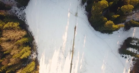 First sunny spring days. Aerial drone footage. Camera moves over trees and river Stock Footage 73672168