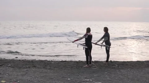 First Surfing training at sunset. Stock Footage 142367466