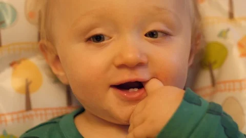 First teeth. Baby infant. Close up of teeth and face. Stock Footage 102587892