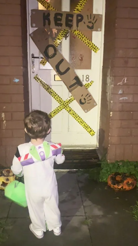 First-Time Trick-or-Treater Changes Their Mind, Liverpool, England, UK - 31 Oct  Stock Footage 320558579