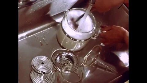 The first two elements of making coffee are water and the grind, which should be Stock Footage 79514065