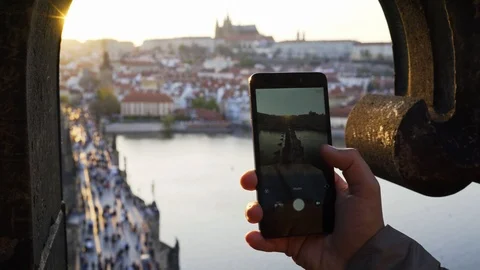 First view man taking photo through the window Video stock 117345696