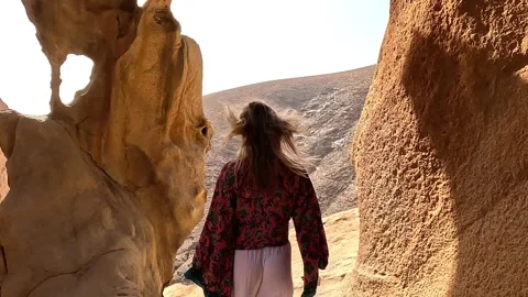 First view of one happy beautiful girl holding hand of her boyfriend walking and Stock Footage 249685570