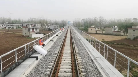 The first view of the train on the railway bridge Stock Footage 300580828