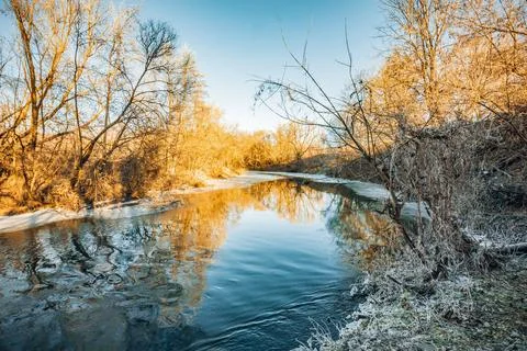The first winter days on the river Stock Photos