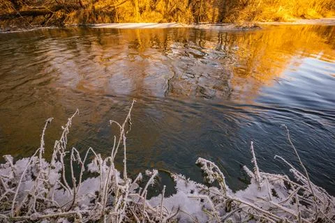 The first winter days on the river Stock Photos