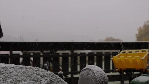 First Winter Snow falling on porch Stock Footage 95803308