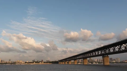 First Yangtze River Bridge in Wuhan with Traffic and Trains Time-lapse Stock Footage 326706570