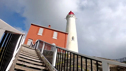 Fisgard Lighthouse Staircase and Black Storm Clouds 4K UHD Stock Footage 339983304
