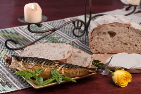 Fish and bread Stock Photos