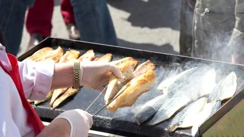 Fish and bread Stock Photos