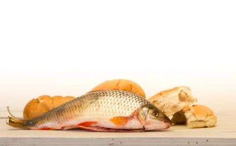 Fish and breads Stock Photos