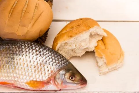 Fish and breads Stock Photos