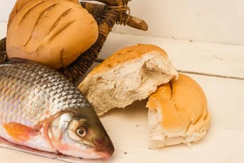 Fish and breads Stock Photos