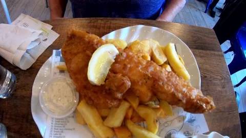Fish And Chips, Calamari, And Chowder At A Restaurant In Dingle, Ireland Stock Footage 159190443