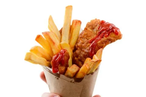 Fish and chips close up on white. Tasty French fries sticks with batter cod Stock Photos