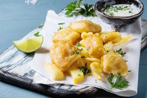 Fish and chips with sauce Stock Photos