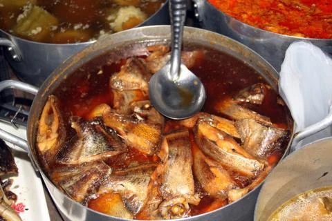 Fish and soup Stock Photos
