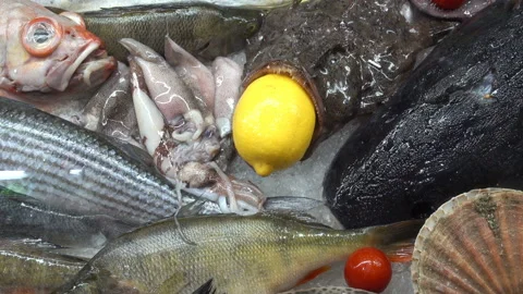 Fish and squid decorated with lemon Stock Footage 139837756