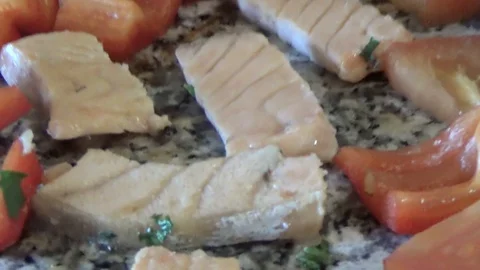 Fish and vegetables fried in stone Stock Footage 91913446