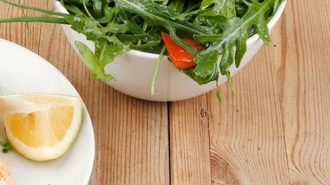 Fish : baked salmon strips with vegetable salad Video stock 88929391