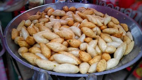 Fish ball fried on a pan. Stock Photos