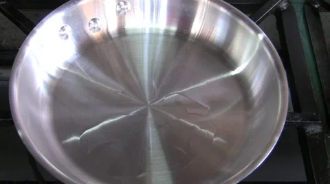 Fish being added in vegetable oil, frying, and moved. Stock Footage 59923060