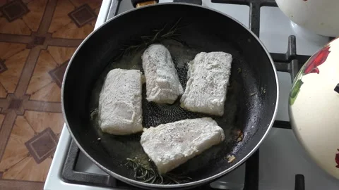 Fish is being cooked in a frying pan. healthy food concept Stock Footage 162015106