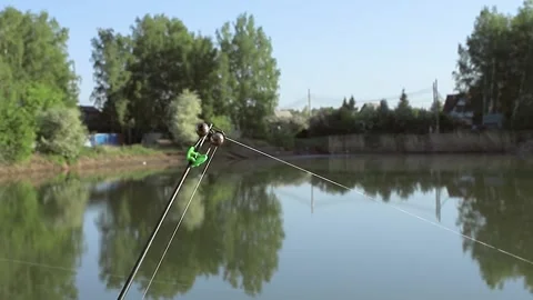 Fish bite. Fish caught on the bait, the rod with a bell twitches Stock Footage 136146491