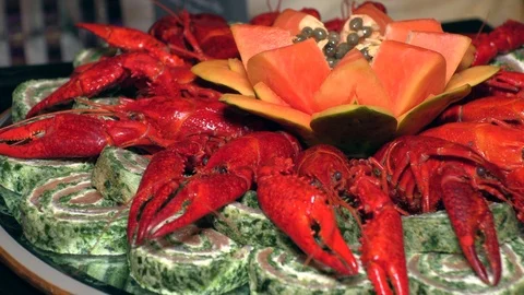 Fish with boiled crayfish laid out on plates Stock Footage 123825457