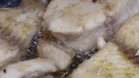Fish boils in oil Stock Footage 107824150