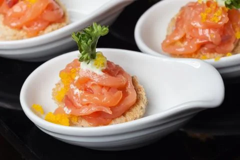 Fish on bread appetizer Stock Photos