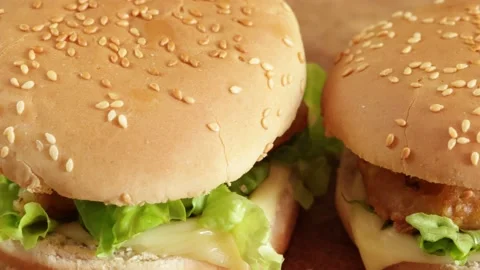 Fish burger, close-up, on a table Stock Footage 235561986