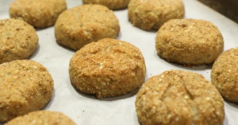 Fish cakes on a baking sheet Video stock 243775915
