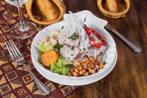Fish ceviche on a elegant restaurant table Stock Photos