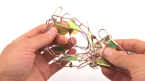 Fish chain stringer with clip metal string for fishing angling to catch food Stock Footage 231586712