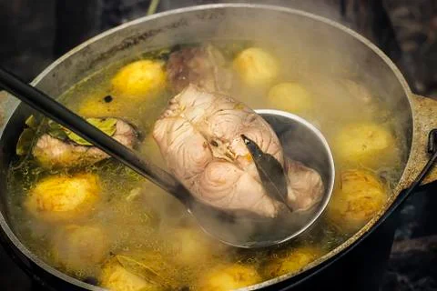 Fish chowder in cast iron pot Stock Photos