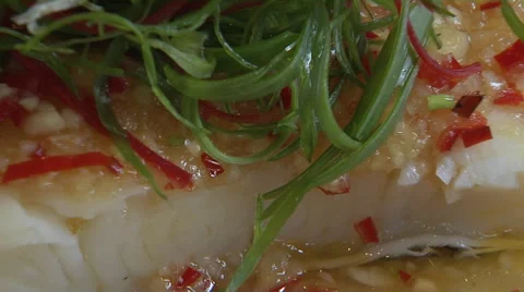 Fish Cooked in Asian Style Stock Footage 57769323