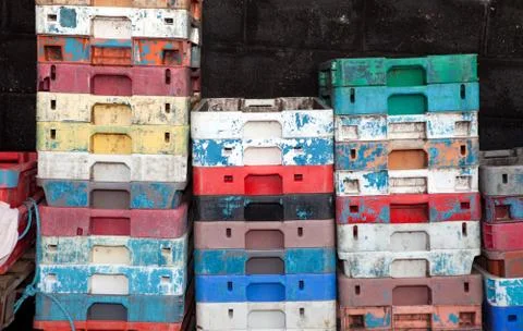 Fish crates plastic boxes Stock Photos