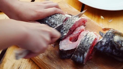 Fish is cut on the cutting board 스톡 동영상 103286358