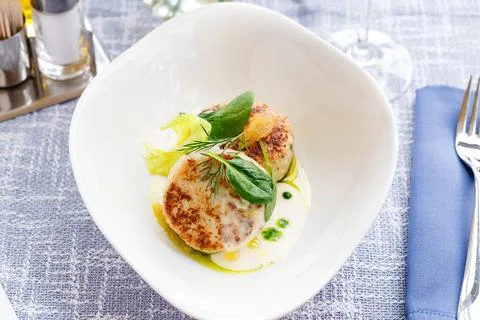 Fish cutlets in restaurant serving Stock Photos